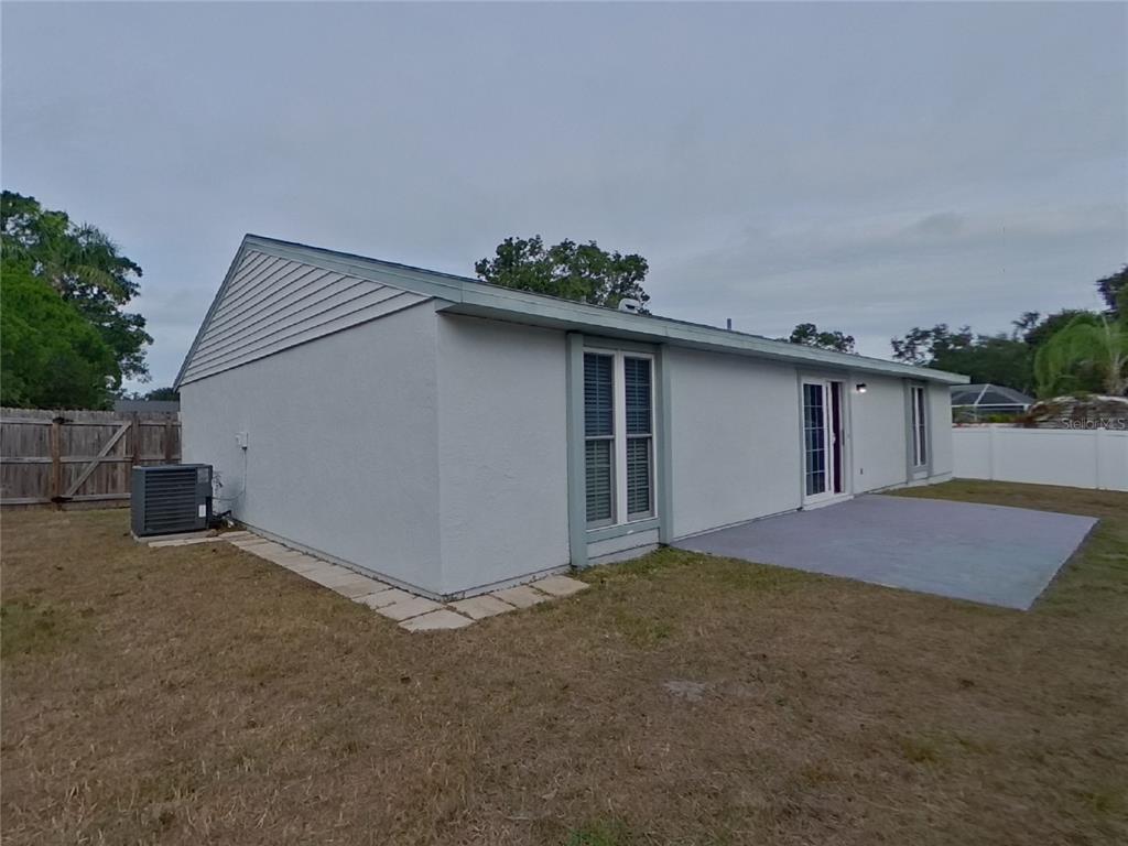 Undisclosed Address Palm Harbor, FL 34684 - Photo 15 of 15 a house with a outdoor space