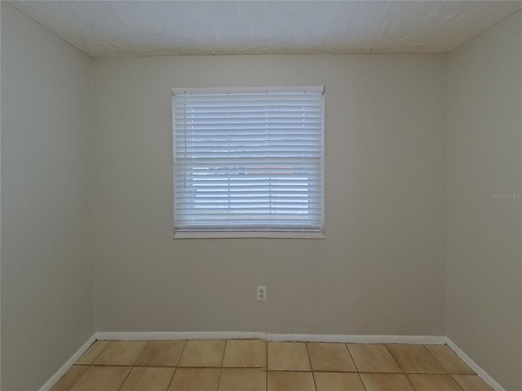 Undisclosed Address Palm Harbor, FL 34684 - Photo 3 of 15 a view of a small space with a window