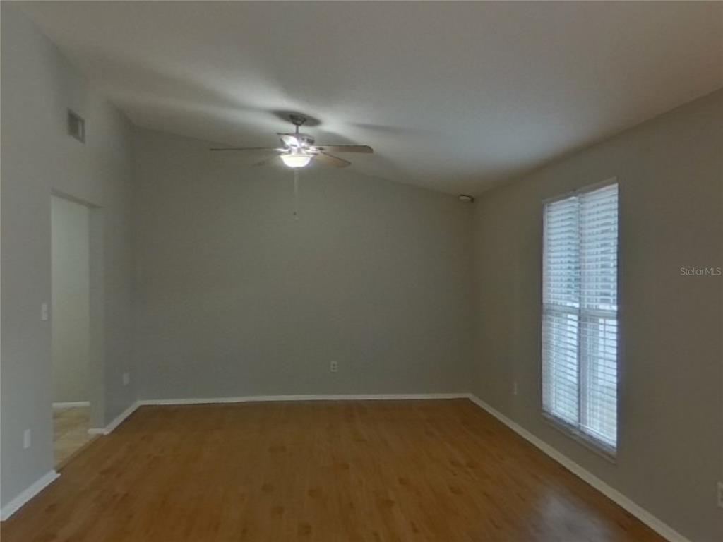 Undisclosed Address Palm Harbor, FL 34684 - Photo 4 of 15 a view of empty room with window