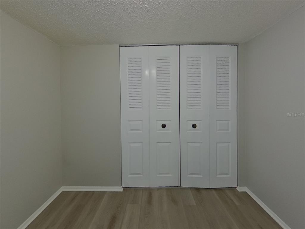 Undisclosed Address Palm Harbor, FL 34684 - Photo 10 of 15 a view of room with hardwood floor