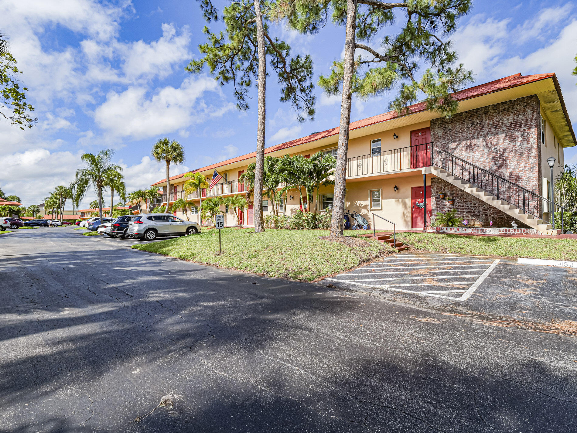 1987 Southwest Palm City Road, Unit BLDG 45 D Stuart, FL 34994 - Photo 4 of 49 a view of street with cars