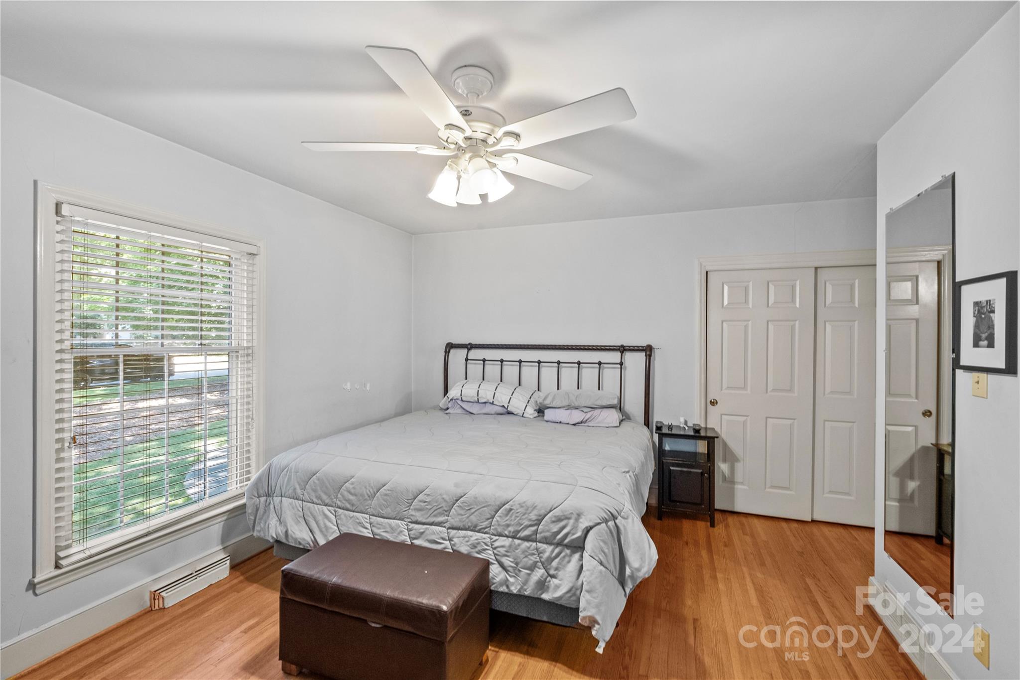 1321 Ferncliff Road Charlotte, NC 28211 - Photo 8 of 11 a bedroom with a large bed and a window