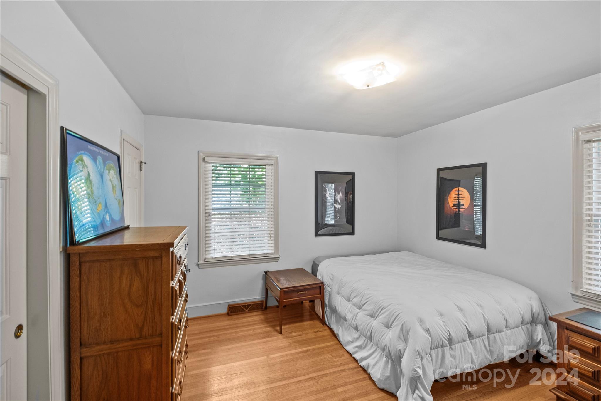 1321 Ferncliff Road Charlotte, NC 28211 - Photo 9 of 11 a bedroom with a bed and a window