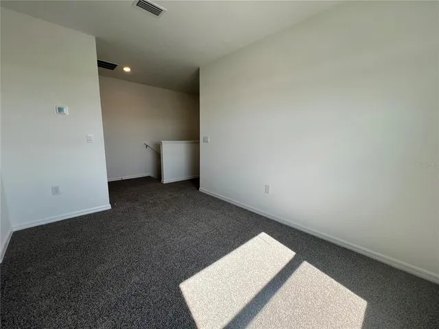 an empty room with an entryway