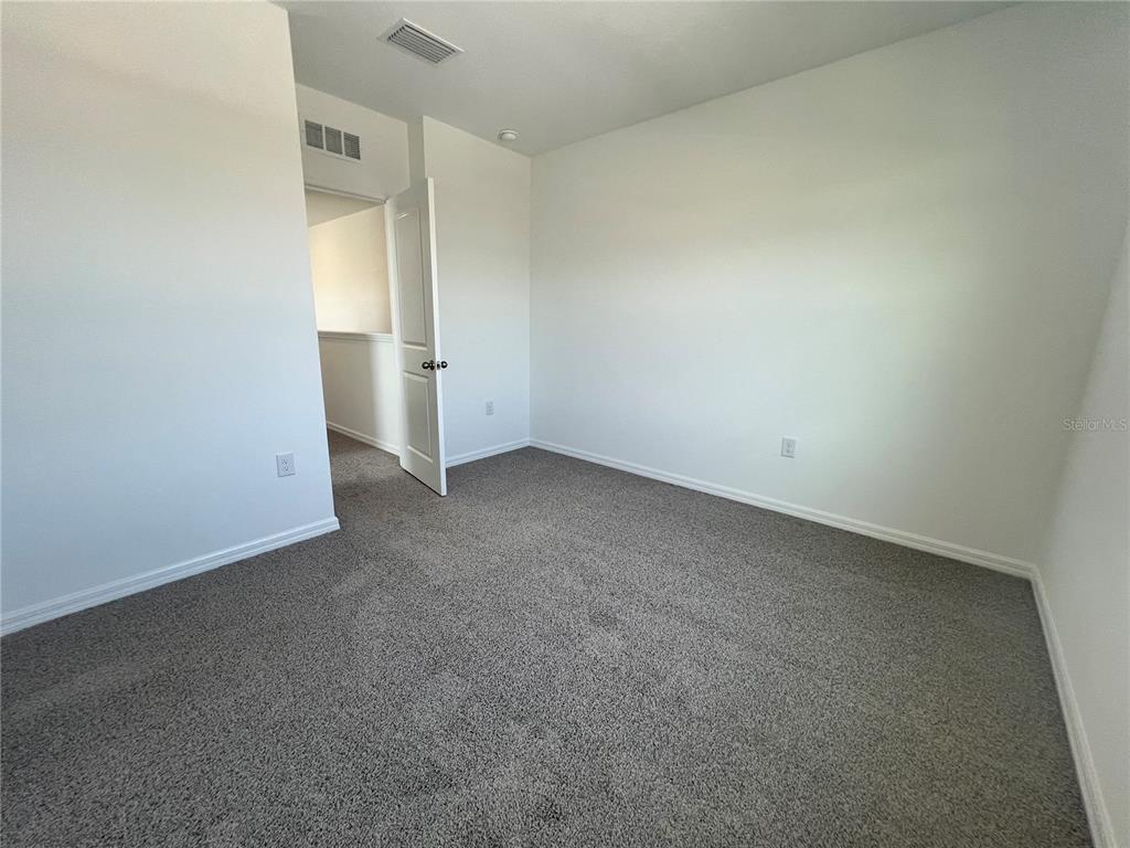 110 Mangrove Shade Circle Apollo Beach, FL 33572 - Photo 26 of 36 an empty room with a bathroom