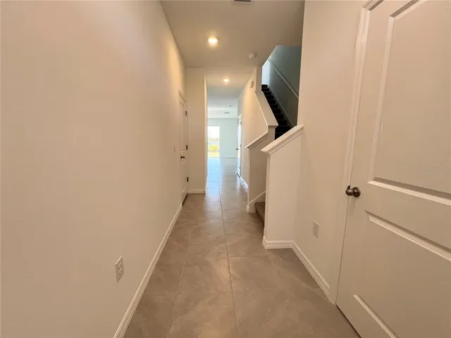 a view of hallway with stairs