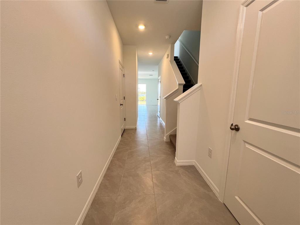 110 Mangrove Shade Circle Apollo Beach, FL 33572 - Photo 3 of 36 a view of hallway with stairs