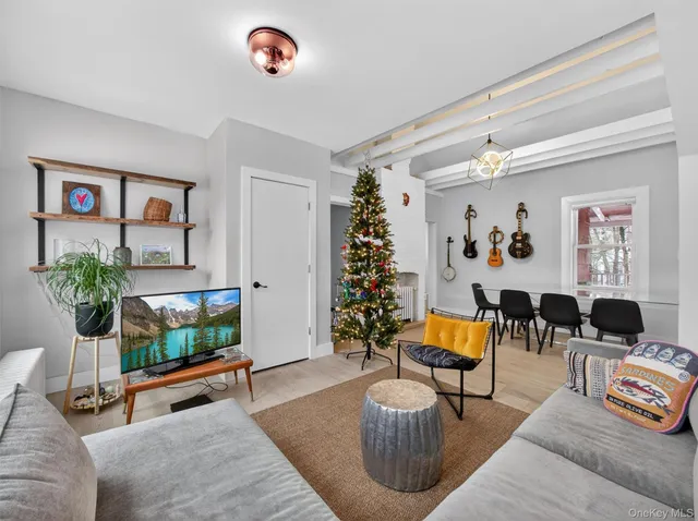 a view of a living room kitchen and a window