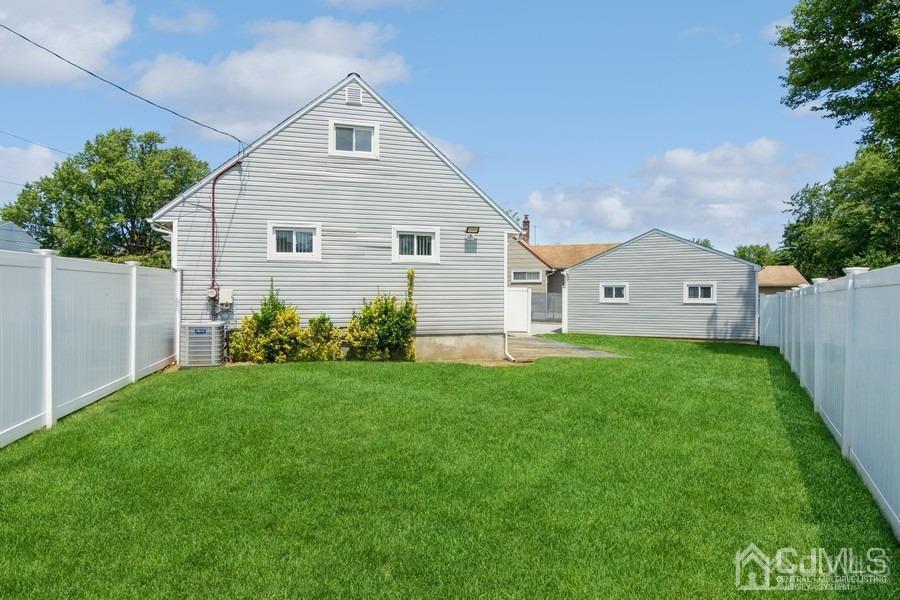 2 Colonial Road Roselle, NJ 07203 - Photo 5 of 17 a view of a house with backyard