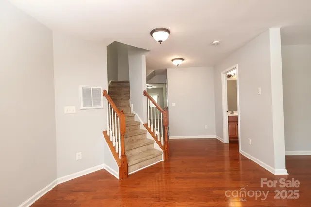 a view of entryway with wooden floor