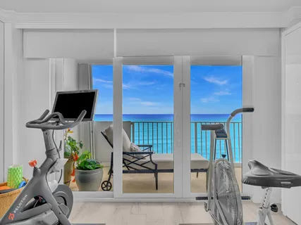 a view of a livingroom with an empty space and a window