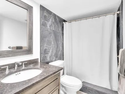a bathroom with a sink and a bathtub