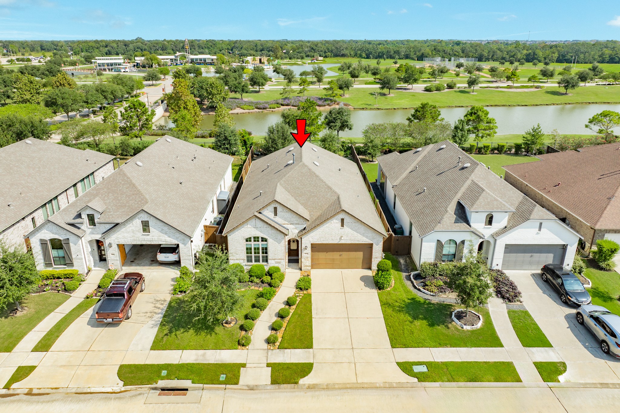 4015 Shackleton Court Iowa Colony, TX 77583 - Photo 35 of 50 Aerial view showcasing the excellent roof condition, expansive waterfront lake, and quiet surrounding neighborhood.