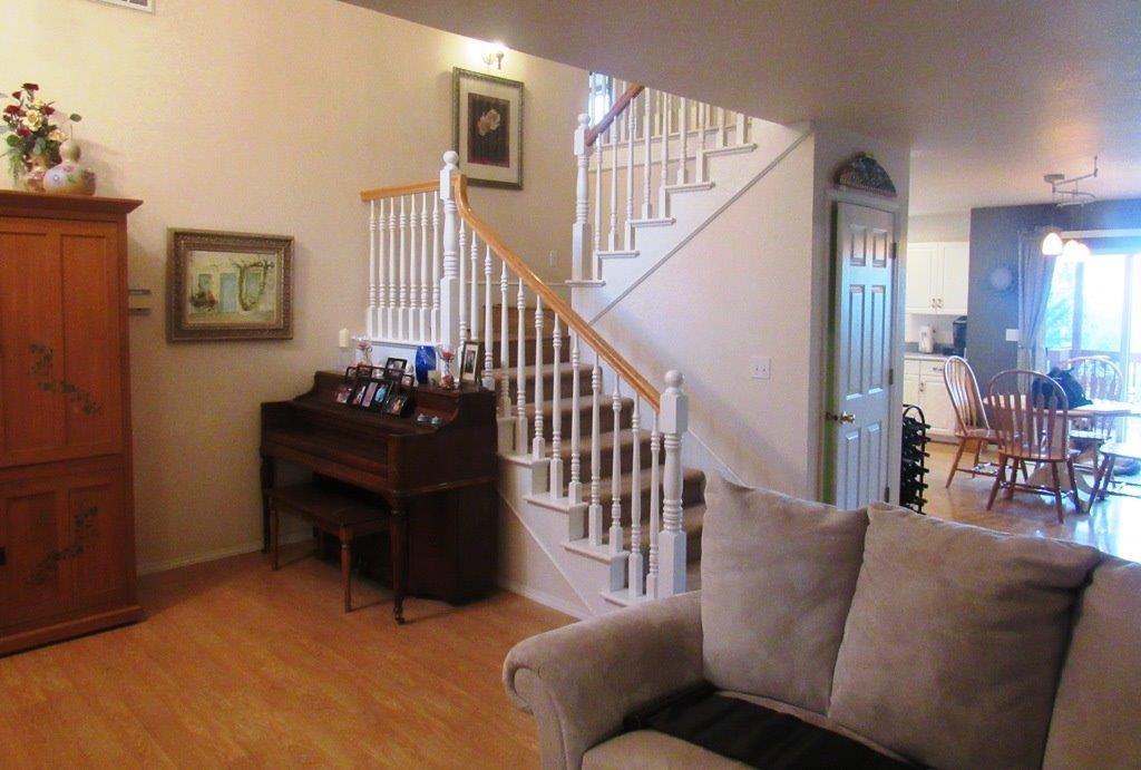 1961 Crow Road Merlin, OR 97532 - Photo 6 of 35 a living room with furniture and a stairs