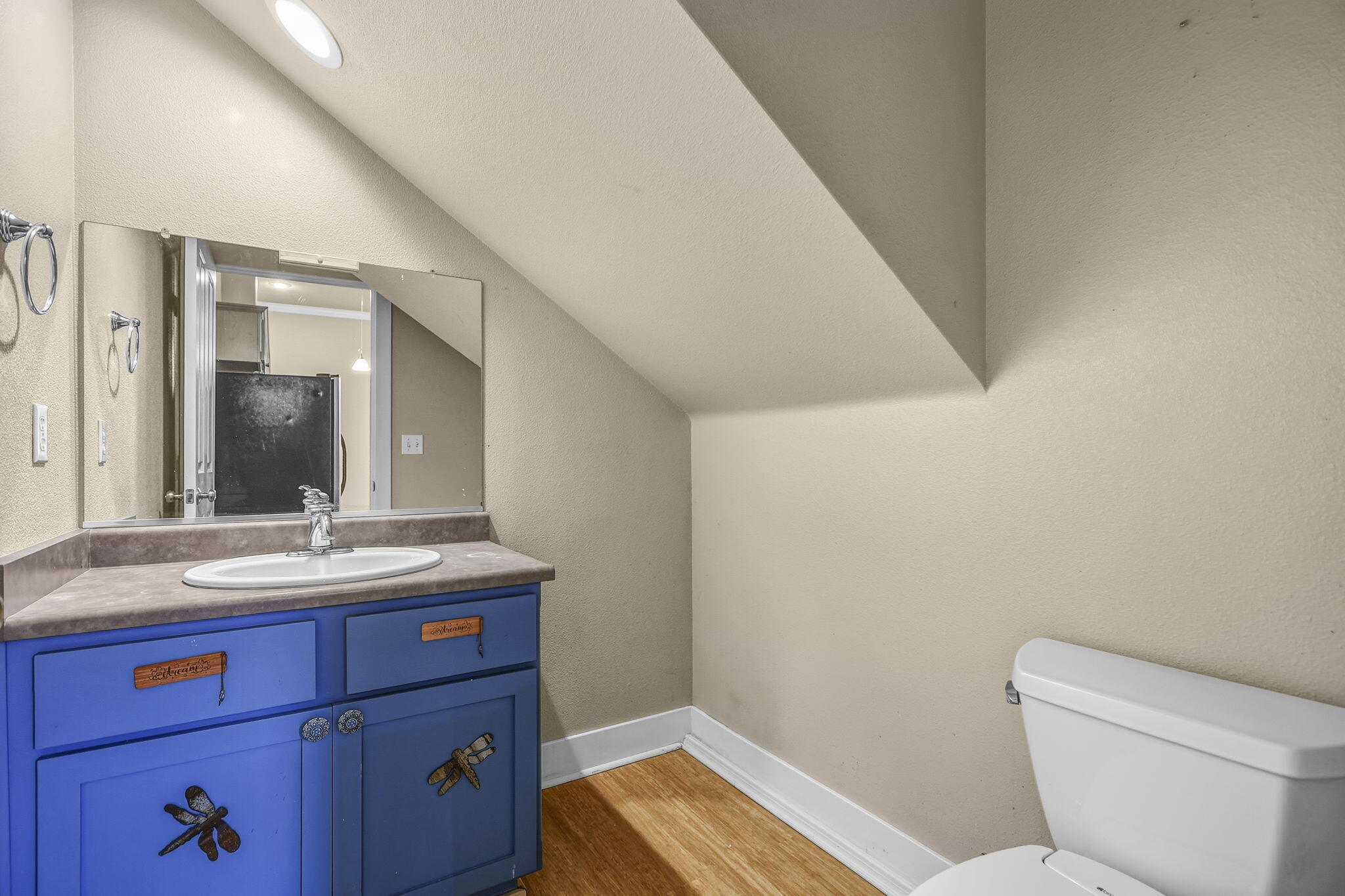 864 Kite Lane Redding, CA 96001 - Photo 11 of 18 a bathroom with a sink and a mirror