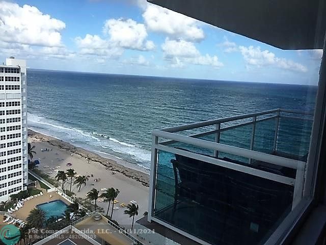 a view of ocean from stairs