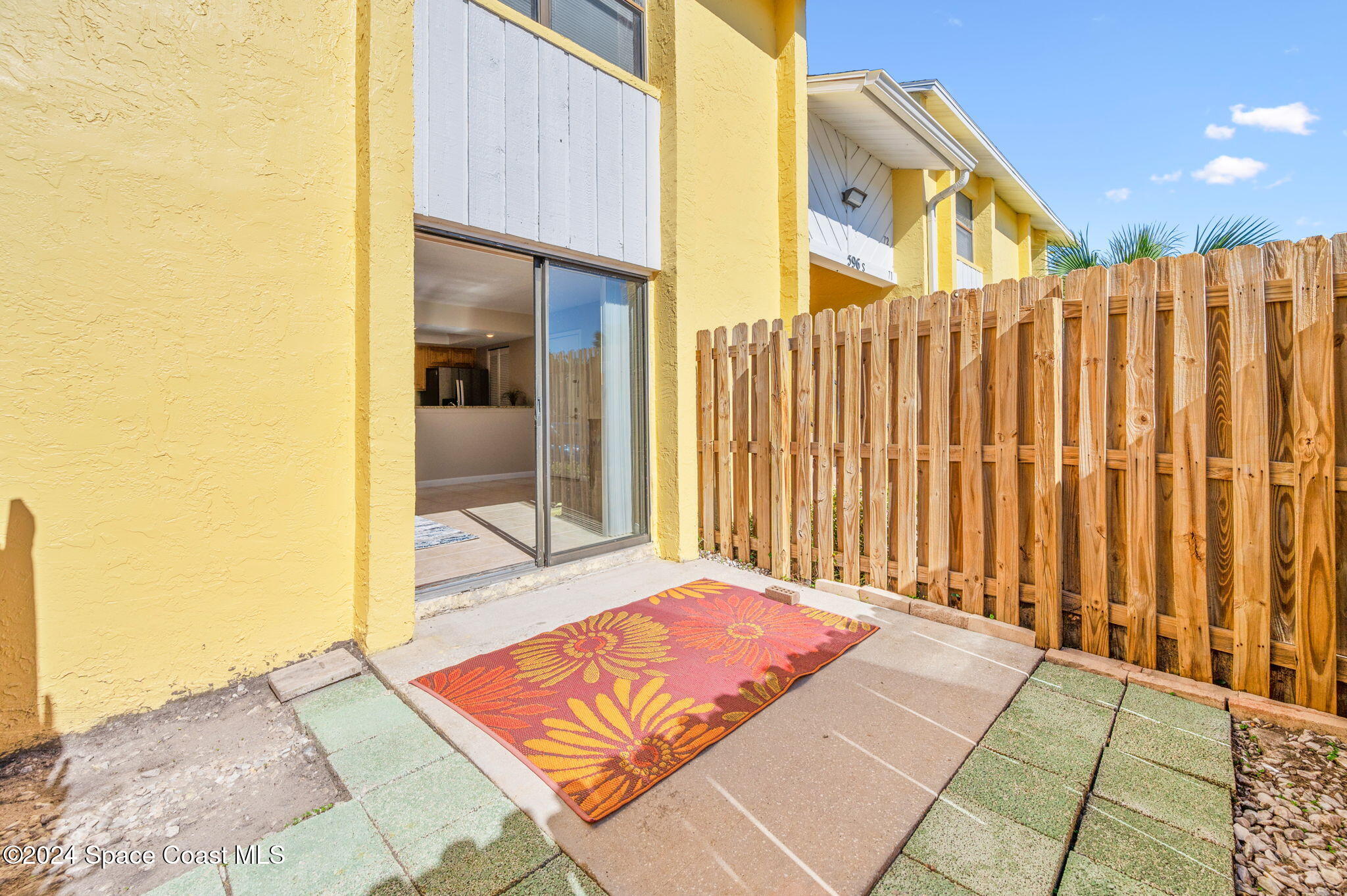 596 North Wickham Road, Unit 69 Melbourne, FL 32935 - Photo 22 of 29 Freshly Powerwashed patio