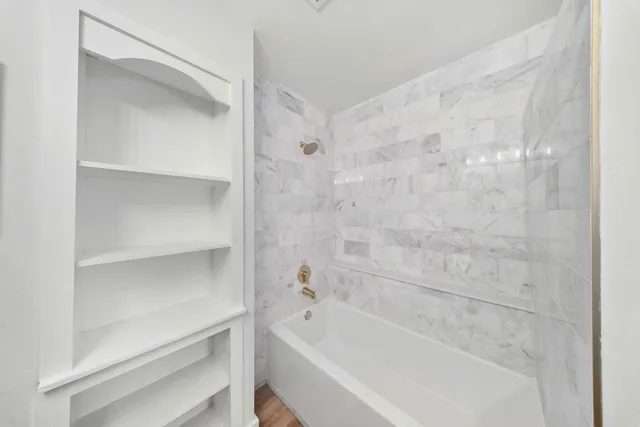 a bathroom with a bathtub