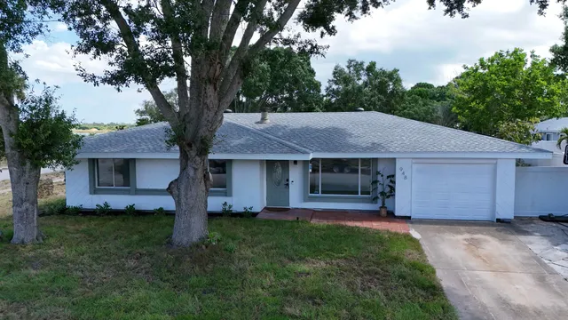 a house view with a garden space