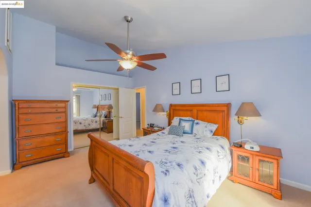 a bed room with a bed and a dresser