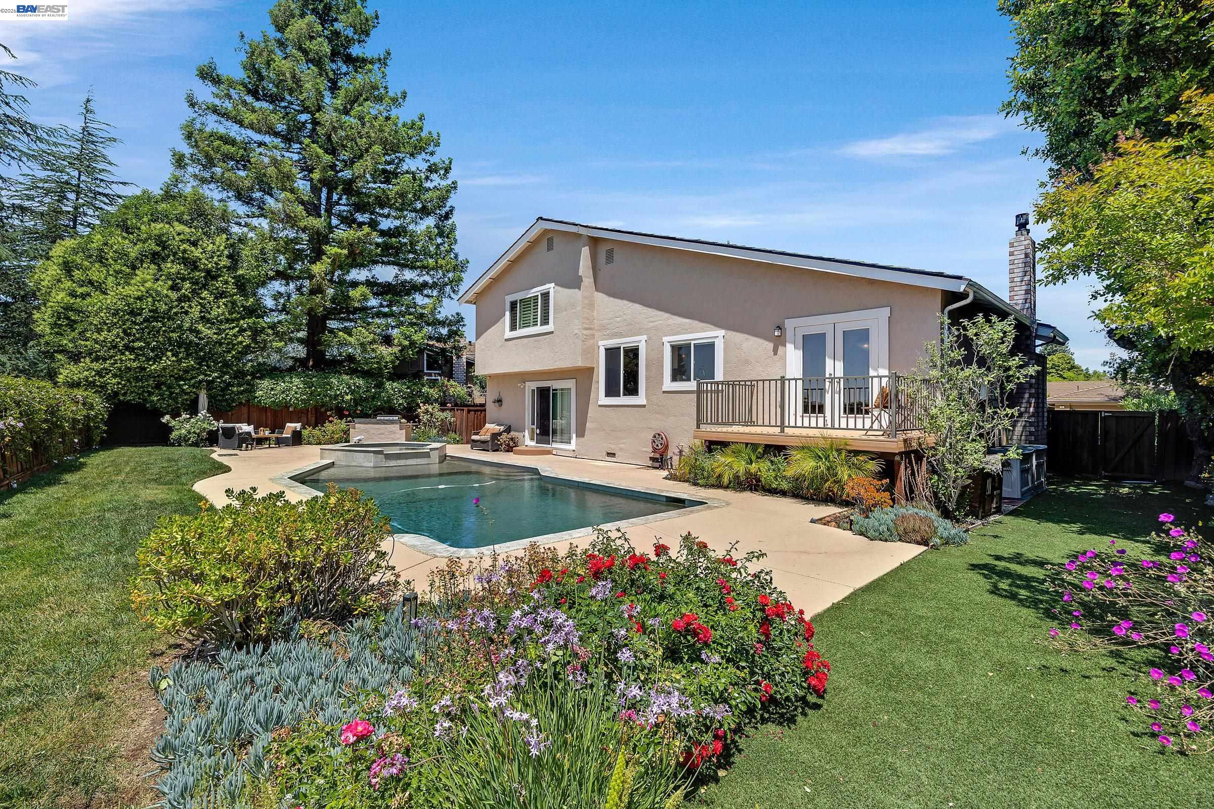 17 Suva Court San Ramon, CA 94582 - Photo 28 of 47 a house with swimming pool in front of it