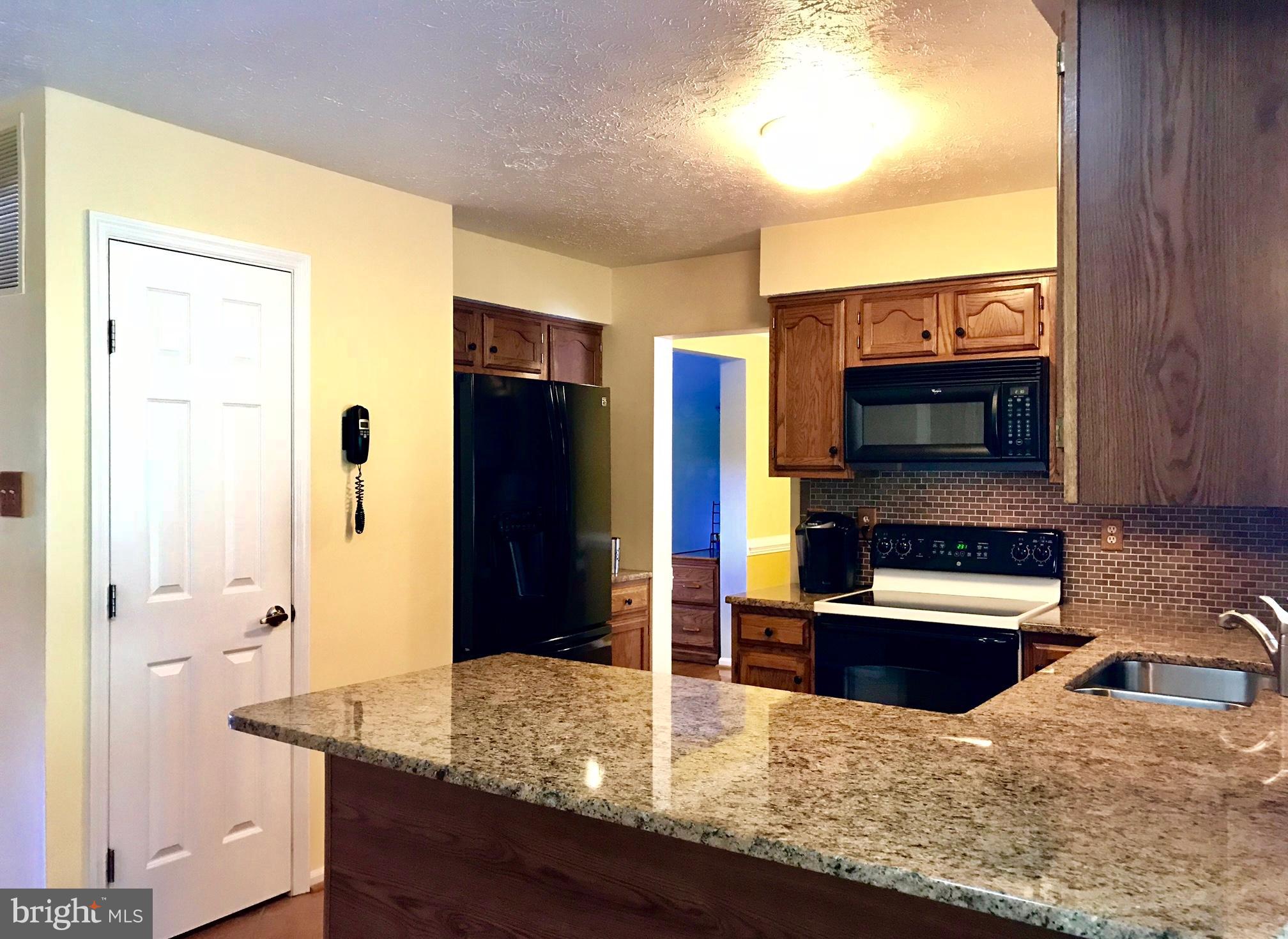 8703 Ridgelys Choice Drive Baltimore, MD 21236 - Photo 6 of 30 Kitchen offers pantry