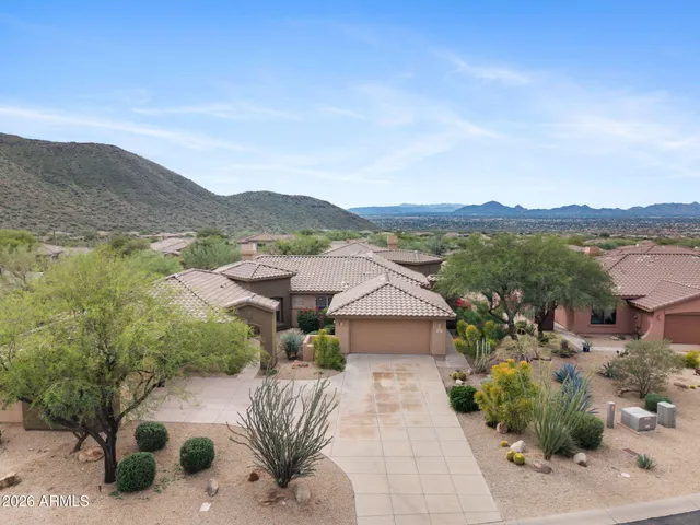 a view of a patio with a mountain in the background