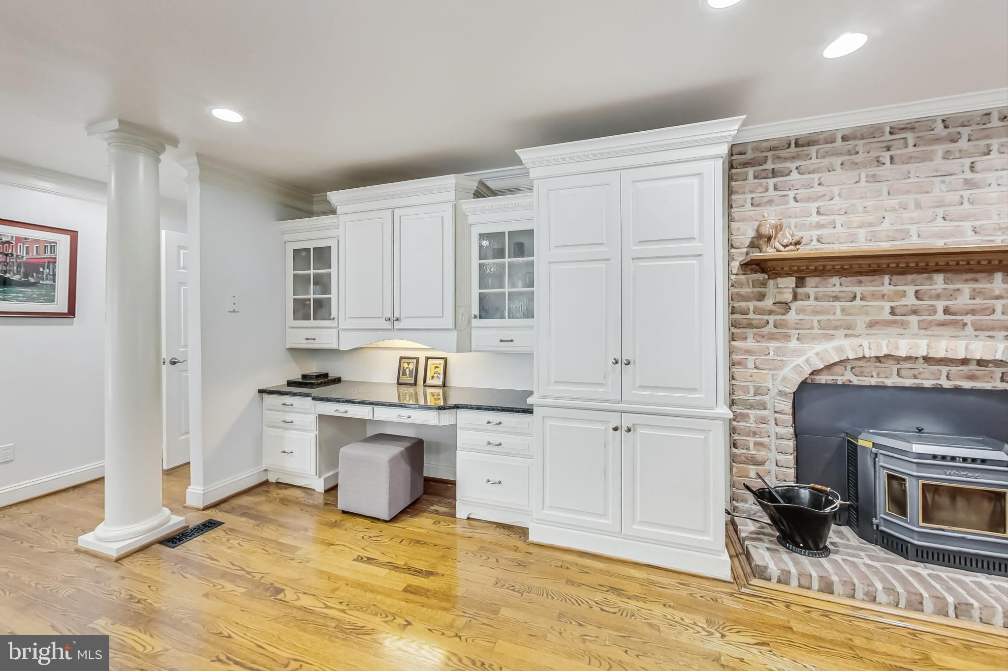 14611 Manor Road Phoenix, MD 21131 - Photo 14 of 85 a kitchen with cabinets and wooden floor