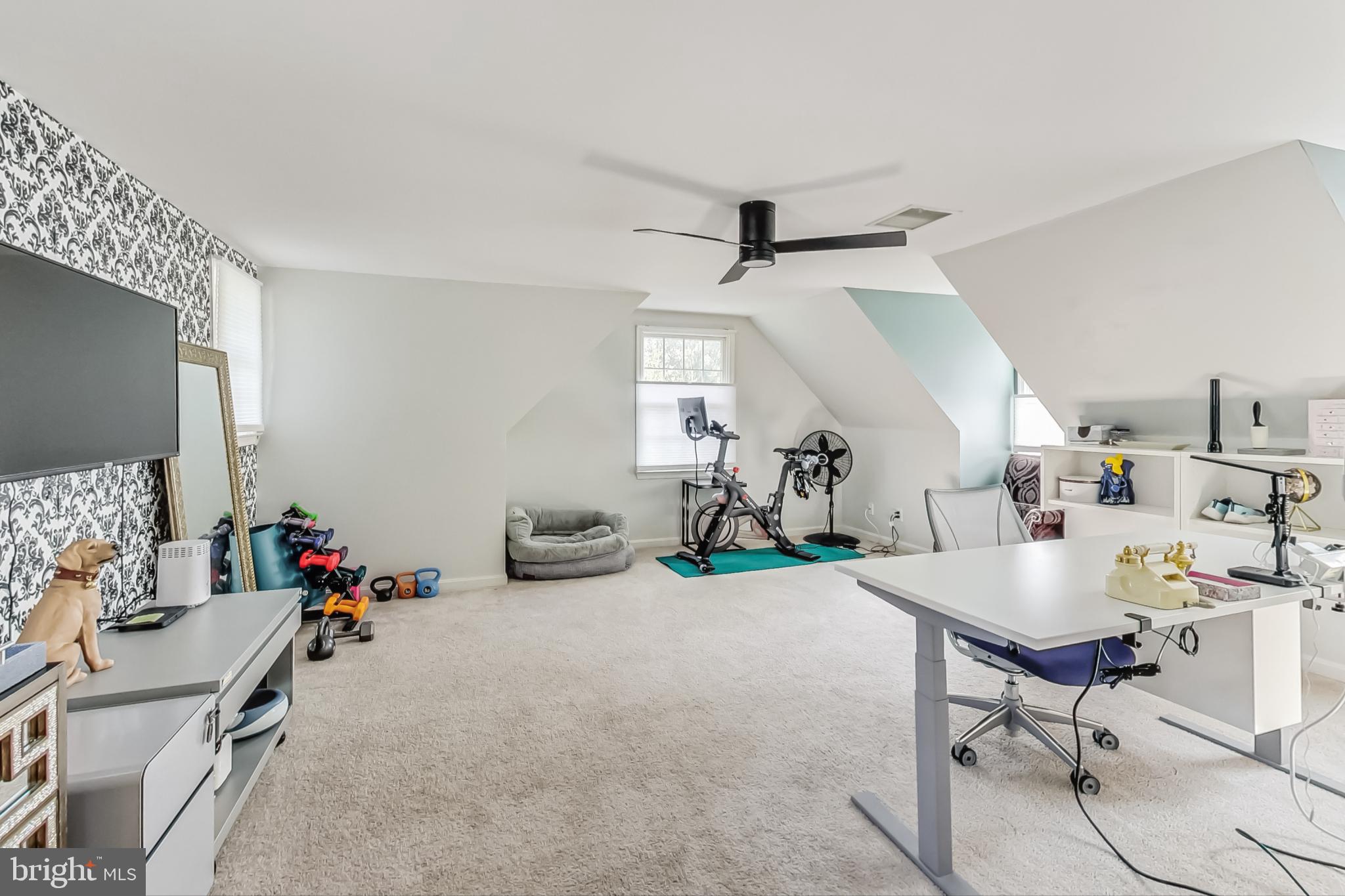 14611 Manor Road Phoenix, MD 21131 - Photo 39 of 85 a room with furniture and a flat screen tv