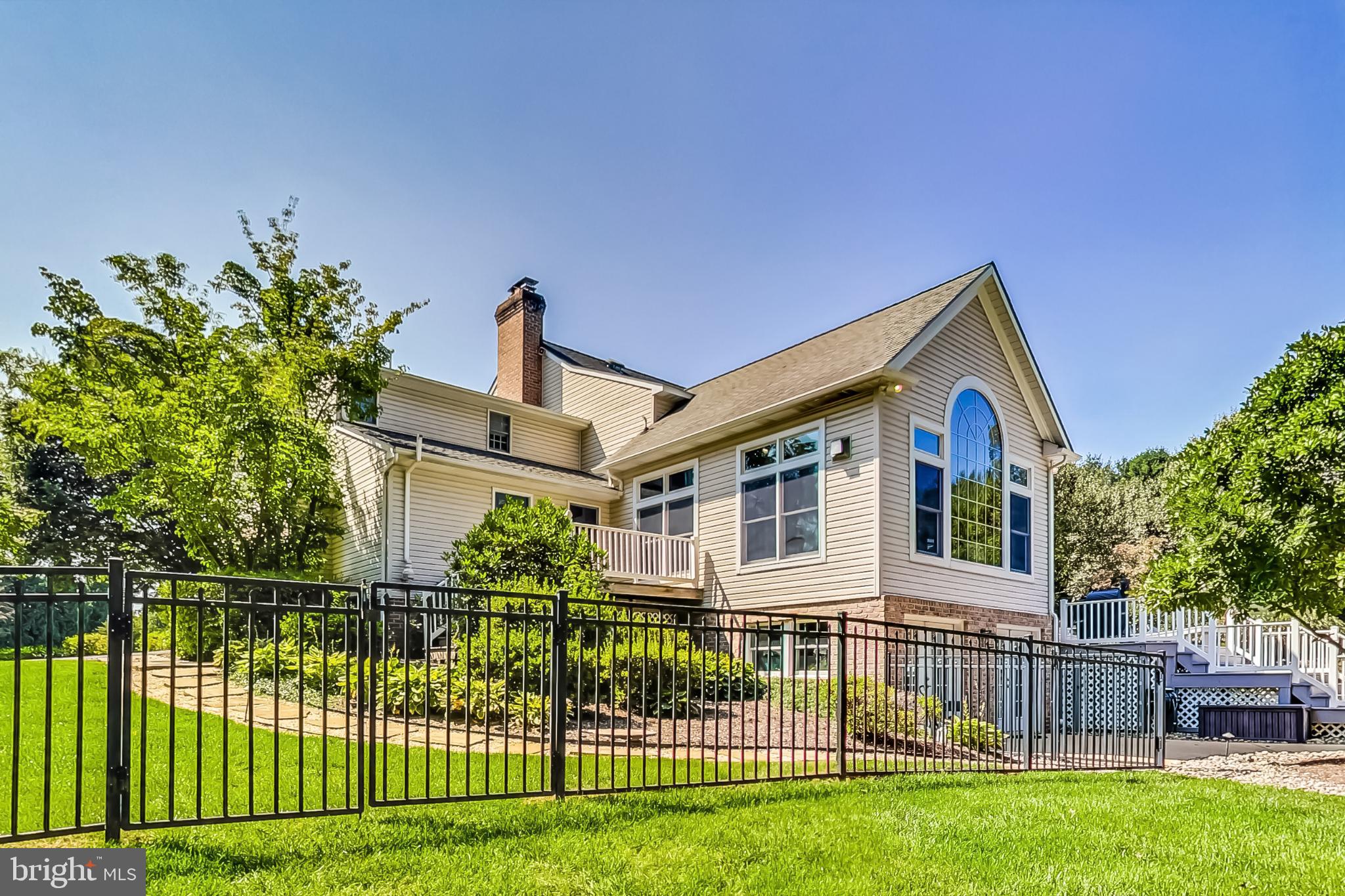 14611 Manor Road Phoenix, MD 21131 - Photo 4 of 85 a front view of a house with a yard