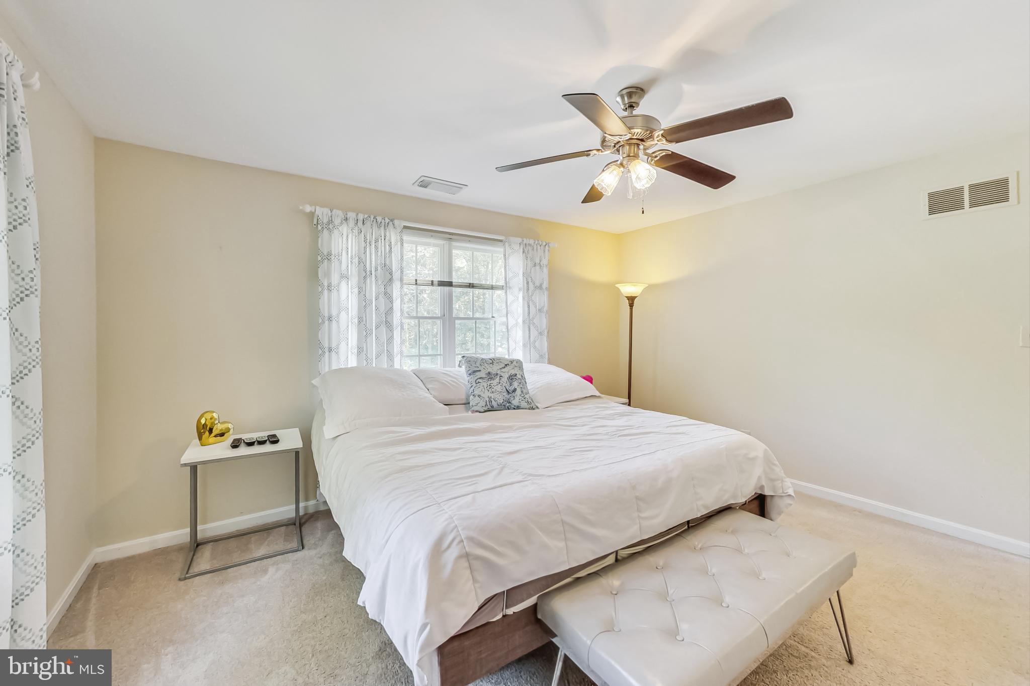 14611 Manor Road Phoenix, MD 21131 - Photo 41 of 85 a bedroom with a bed and window