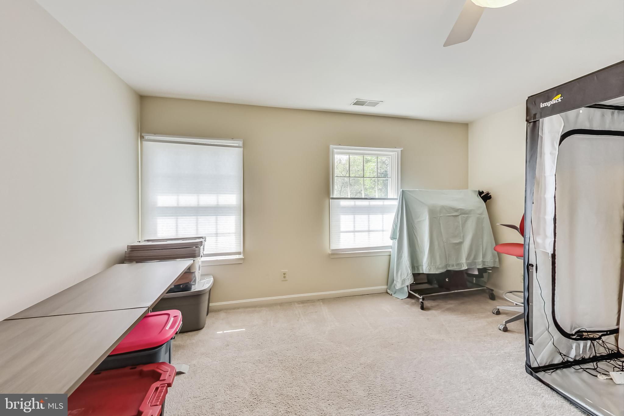 14611 Manor Road Phoenix, MD 21131 - Photo 42 of 85 a room with gym equipment and a window