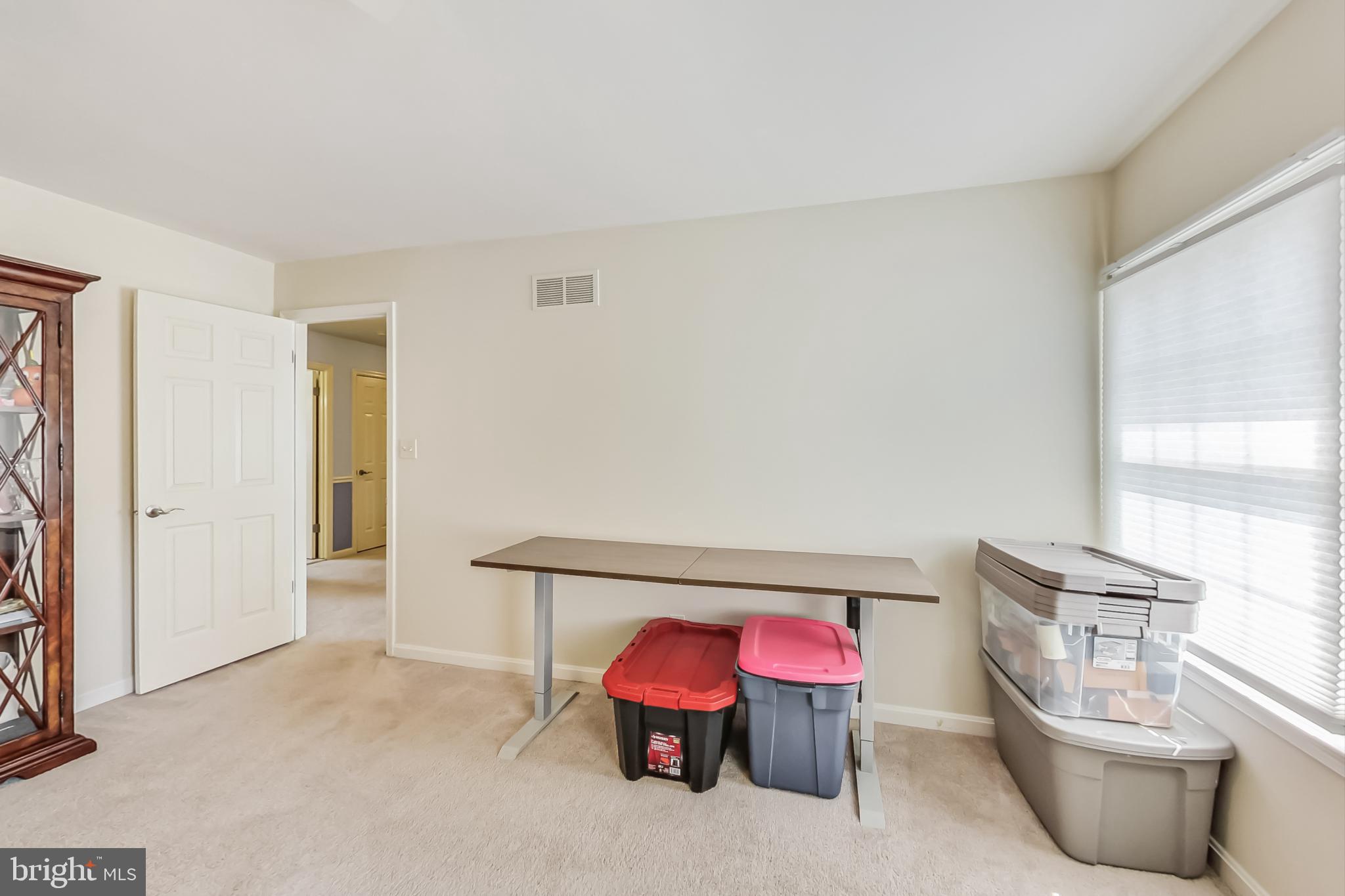 14611 Manor Road Phoenix, MD 21131 - Photo 43 of 85 a living room with furniture a window and wooden floor