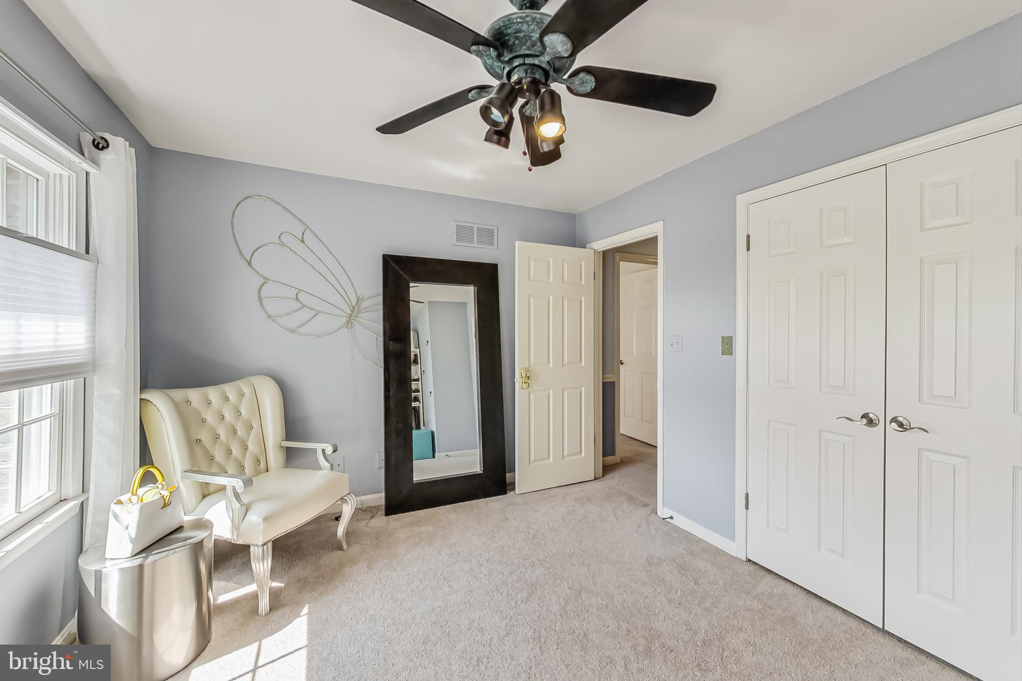 14611 Manor Road Phoenix, MD 21131 - Photo 45 of 85 a living room with furniture and a ceiling fan