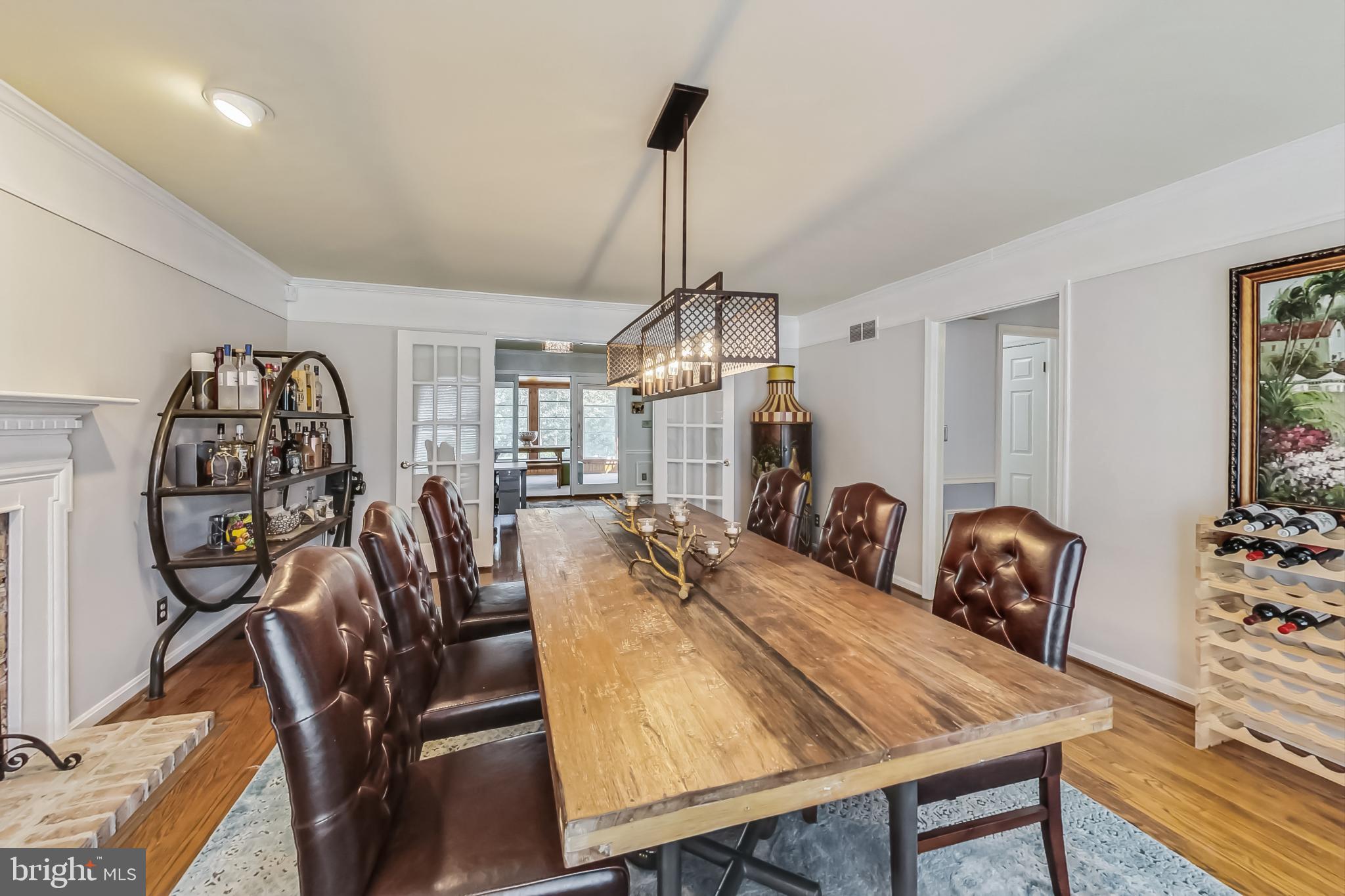 14611 Manor Road Phoenix, MD 21131 - Photo 10 of 85 a view of a dining room with furniture and wooden floor