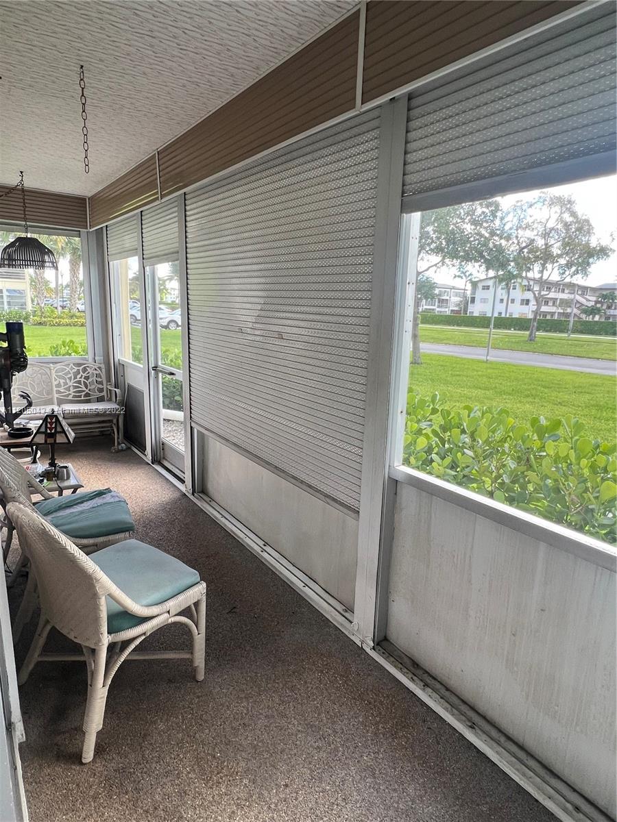 179 Dorset East, Unit 179 Boca Raton, FL 33434 - Photo 10 of 13 a outdoor space with furniture