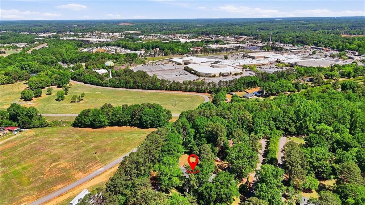 504 Jeb Stuart Avenue Anderson, SC 29621 - Photo 47 of 47 Aerial view showcasing expansive green spaces alongside urban amenities and infrastructure.