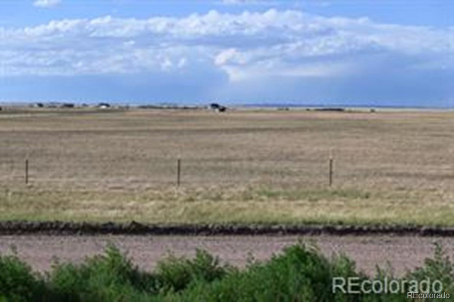 96 Tbd County Road Pierce, CO 80650 - Photo 3 of 3 a view of a lake and mountain in back
