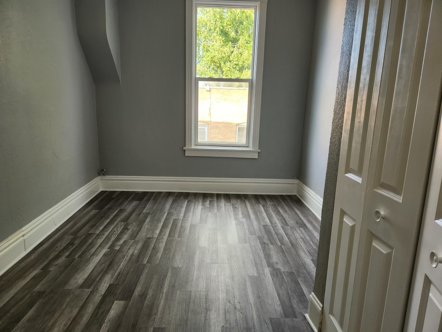 7 National Street, Unit 7 Elgin, IL 60123 - Photo 4 of 10 a view of wooden floor in a room