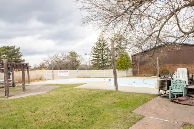 a view of a outdoor space and swimming pool