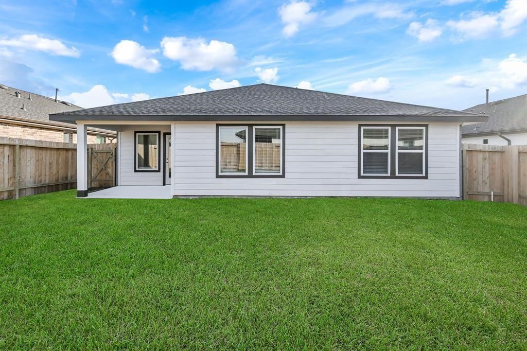 226 Serena Park Lane Rosharon, TX 77583 - Photo 15 of 19 a front view of house with yard and green space