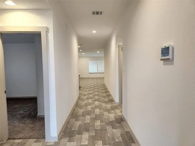 a bathroom with a toilet sink and shower