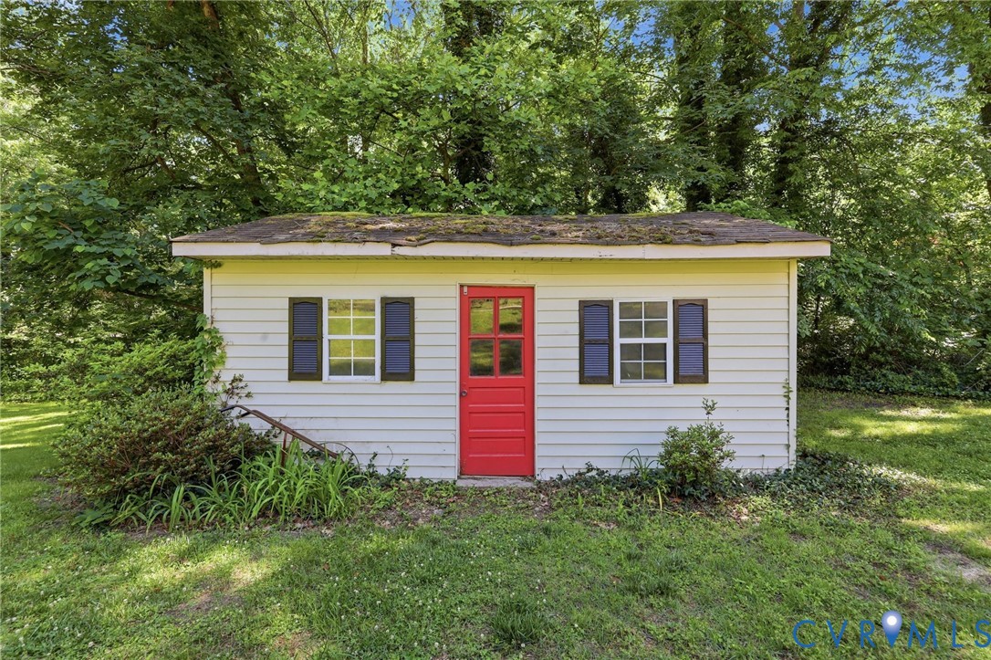 11200 Surry Road Chester, VA 23831 - Photo 42 of 48 a front view of a house with a yard