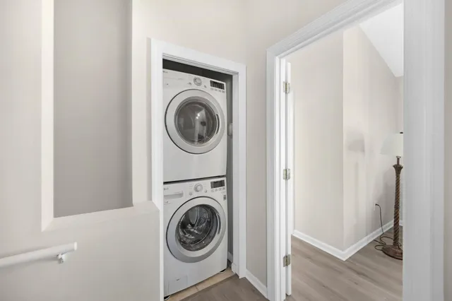 a kitchen with stainless steel appliances a sink stove and refrigerator