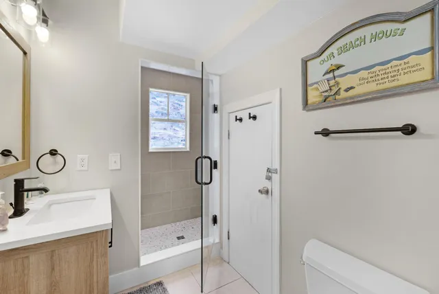a view of a porch with furniture and wooden deck