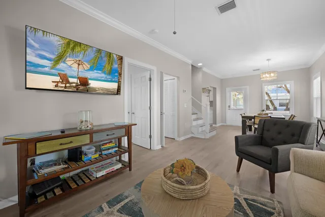 a view of two chairs in a balcony