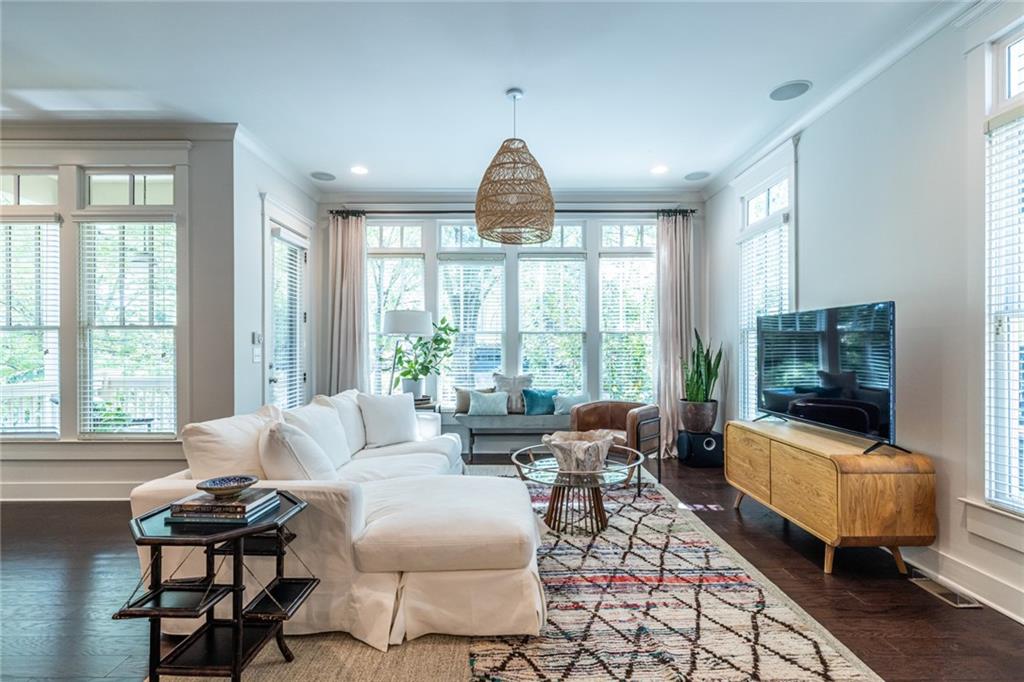 1005 Braeburn Lane Decatur, GA 30030 - Photo 11 of 25 a living room with furniture and a flat screen tv