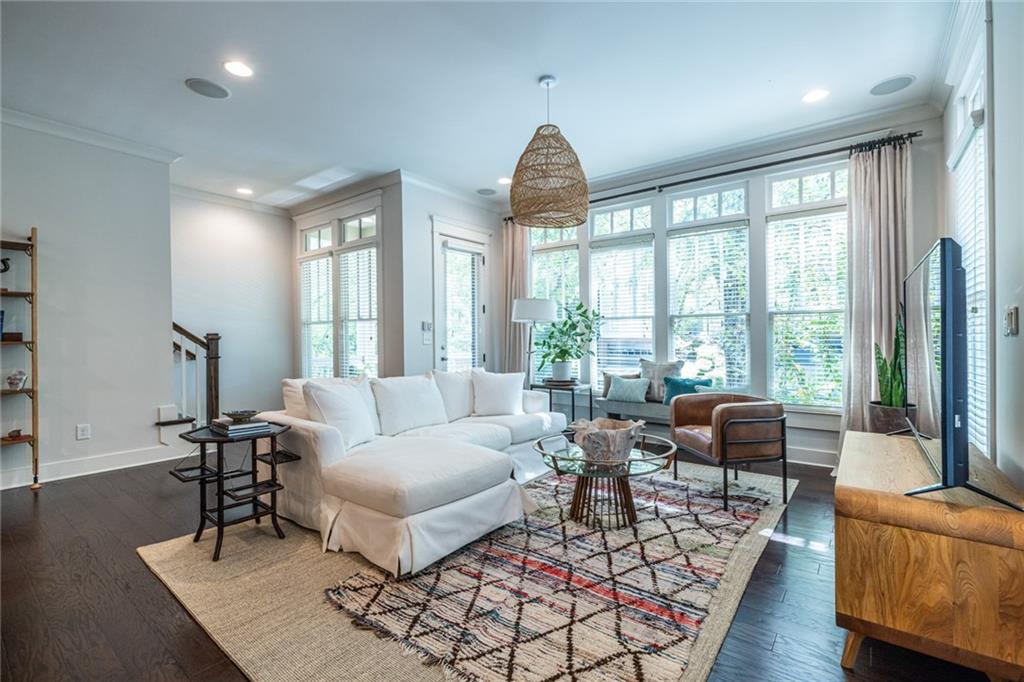 1005 Braeburn Lane Decatur, GA 30030 - Photo 12 of 25 a living room with furniture and a large window