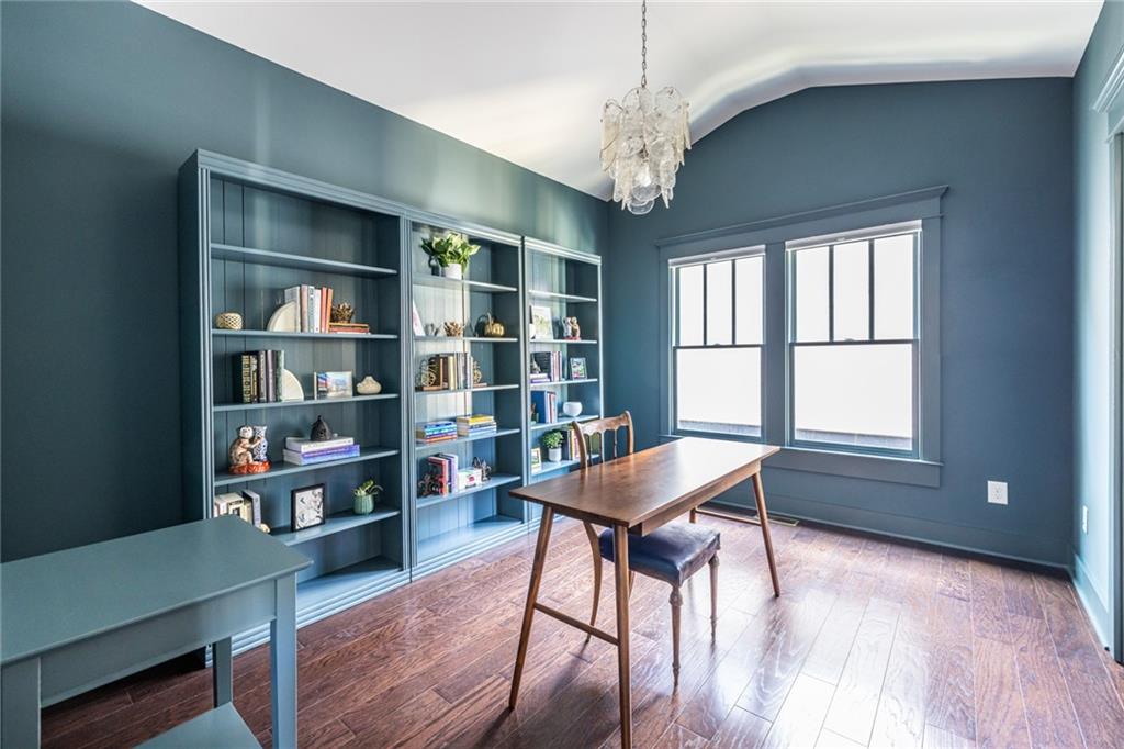 1005 Braeburn Lane Decatur, GA 30030 - Photo 19 of 25 a workspace with chandelier and wooden floor