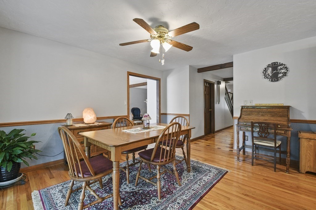 60 Lincoln Point Road Charlton, MA 01507 - Photo 11 of 42 a view of a dining room with furniture and wooden floor